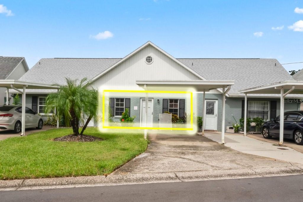 Photo of 6101 Elmhurst Dr #5B, New Port Richey, FL 34653 (MLS # W7878816)