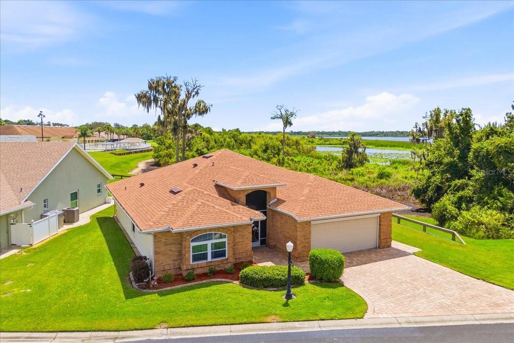 Photo of 440 Sweetwater Way, Haines City, FL 33844 (MLS # O6439733)