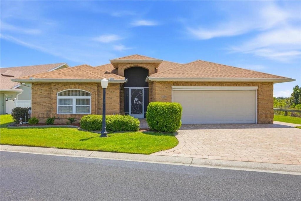 Photo of 440 Sweetwater Way, Haines City, FL 33844 (MLS # O6439733)