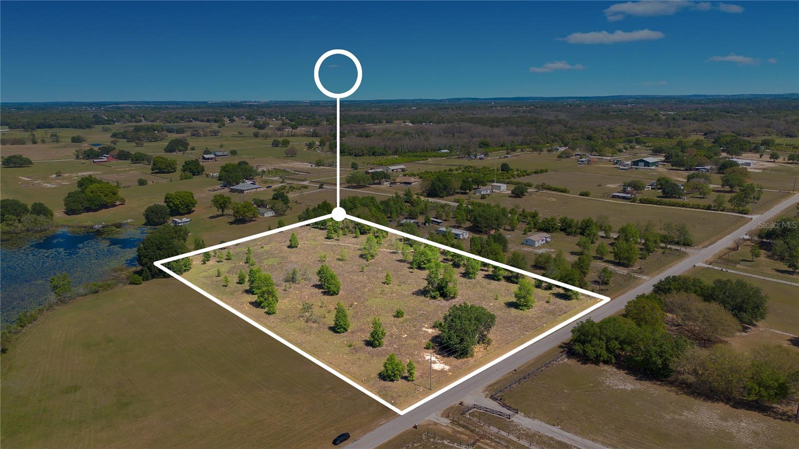 Get ready to build your dream home on this fantastic 5 acreage parcel with an existing well and a nice lake view. There are endless possibilities for the type of home you could construct on this high and dry, mostly cleared lot.
Nestled in Groveland, just a few miles south of Highway 50, this lot offers the perfect balance between rural tranquility and urban convenience, with ample shopping and dining options nearby. You'll have easy access to major highways, Orlando's attractions, and numerous parks. This property has a range of potential uses, making it suitable for a family ranch. Picture yourself spending afternoons and evenings watching your horses or cattle from a window in your home.
Additionally, there is a body of water behind the lot, providing opportunities for fishing. Don't miss this chance to build a beautiful home and revel in the serenity and privacy that this land parcel offers.
Another advantage of this property is that it comes without any homeowner's association (HOA) restrictions, providing more flexibility in how you use your land.
However, it's essential for the buyer to confirm all potential land uses with Lake County planning and zoning regulations. Feel free to reach out today for more information or to schedule a showing.