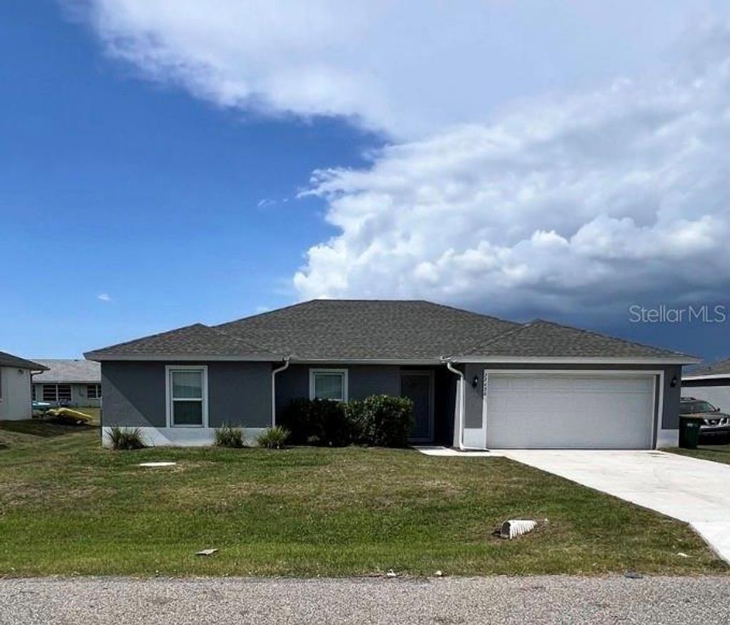 Photo of 22480 La Guardia Avenue, Port Charlotte, FL 33952 (MLS # TB8501266)