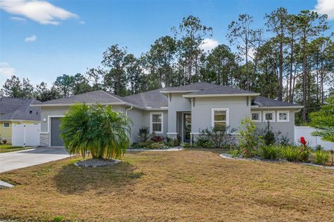 Photo of 99 Patric Drive, Palm Coast, FL 32164 (MLS # FC315532)