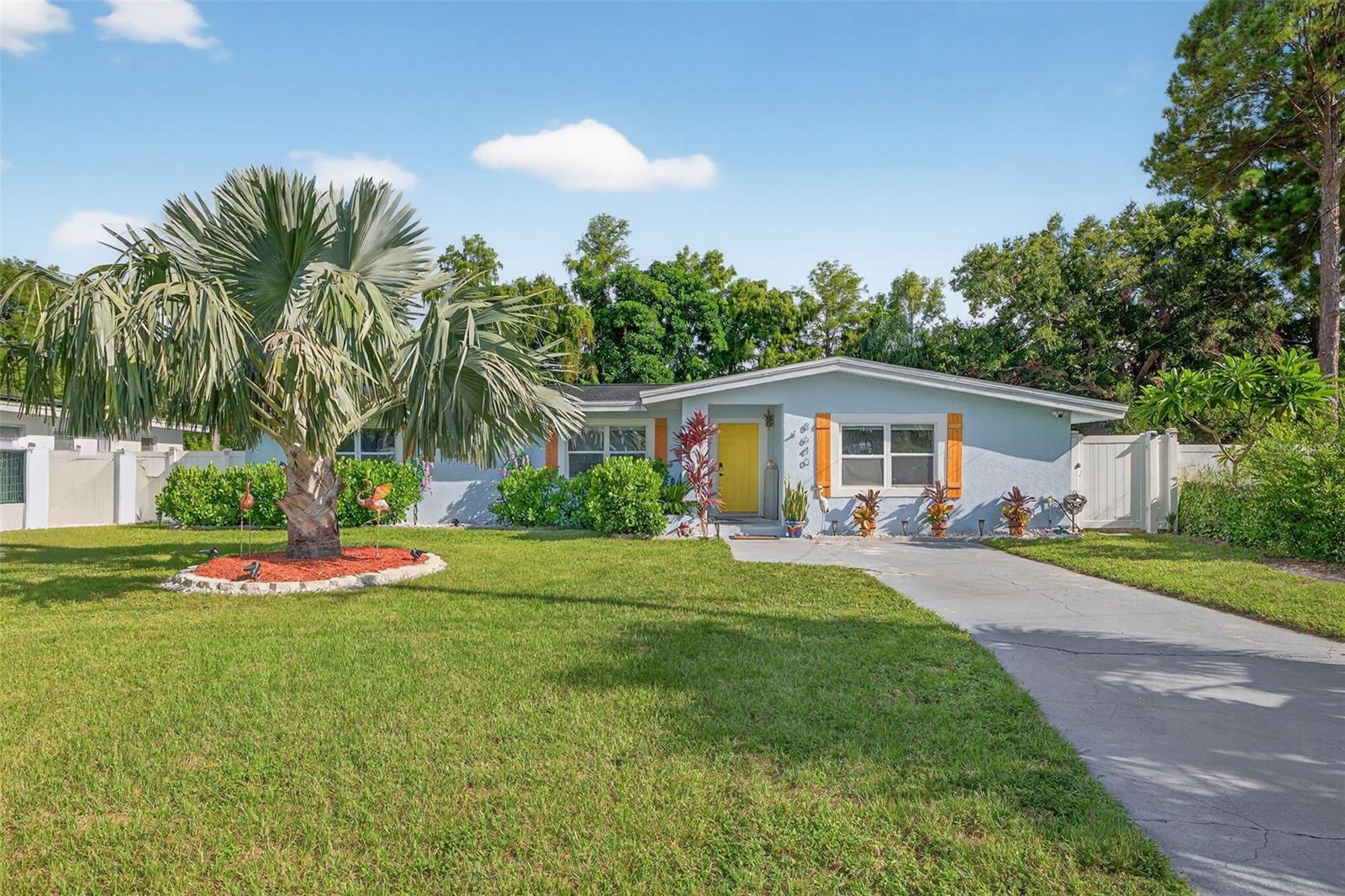 HIGH AND DRY SEMINOLE BLOCK HOME in NON FLOOD ZONE! Beautifully designed 4 bedroom, 3 full bathroom home in the desirable Bardmoor neighborhood! This home was made for entertaining - from the moment you walk in you're greeted with lovely touches, from the real wood shutters and tropical landscaping to the updated floors and finishes. Rejoice in no rear neighbors--just a tranquil pond for company. Open and inviting the layout is exactly what you've been looking for--with a split floor plan, DOUBLE master suites, large updated kitchen, MASSIVE screened lanai and fenced yard -- this home is a DREAM. Did we mention peace of mind with a New Roof in 2021?! Rule your roost--NO Flood Zone & NO HOA. Just bring your boat or RV and enjoy and enjoy your best Florida life. As you drive up to this home, you will notice the charming curb appeal. Tastefully updated kitchen with new cabinets, counter tops, stainless steel appliances, subway tile backsplash. The kitchen leads to a light and bright dining room. Use it as a formal dining space, play room, or office! Choose your own adventure with not one but TWO spacious primary suites with ensuite bathrooms with modern updates and finishes. The additional well appointed bedrooms give everyone room to spread out. The world is your oyster in this oversized back yard -- plenty of room for a pool, garden, putting green, storage, workshop or to make your own tropical oasis! On the other side of the property line is a tranquil pond as your rear neighbor. Close to top Seminole schools, Seminole Golf & Country Club, Lake Seminole Park, pristine award winning beaches, Seminole City Center restaurants/shopping, Bay Pines, and more! Schedule your tour today!