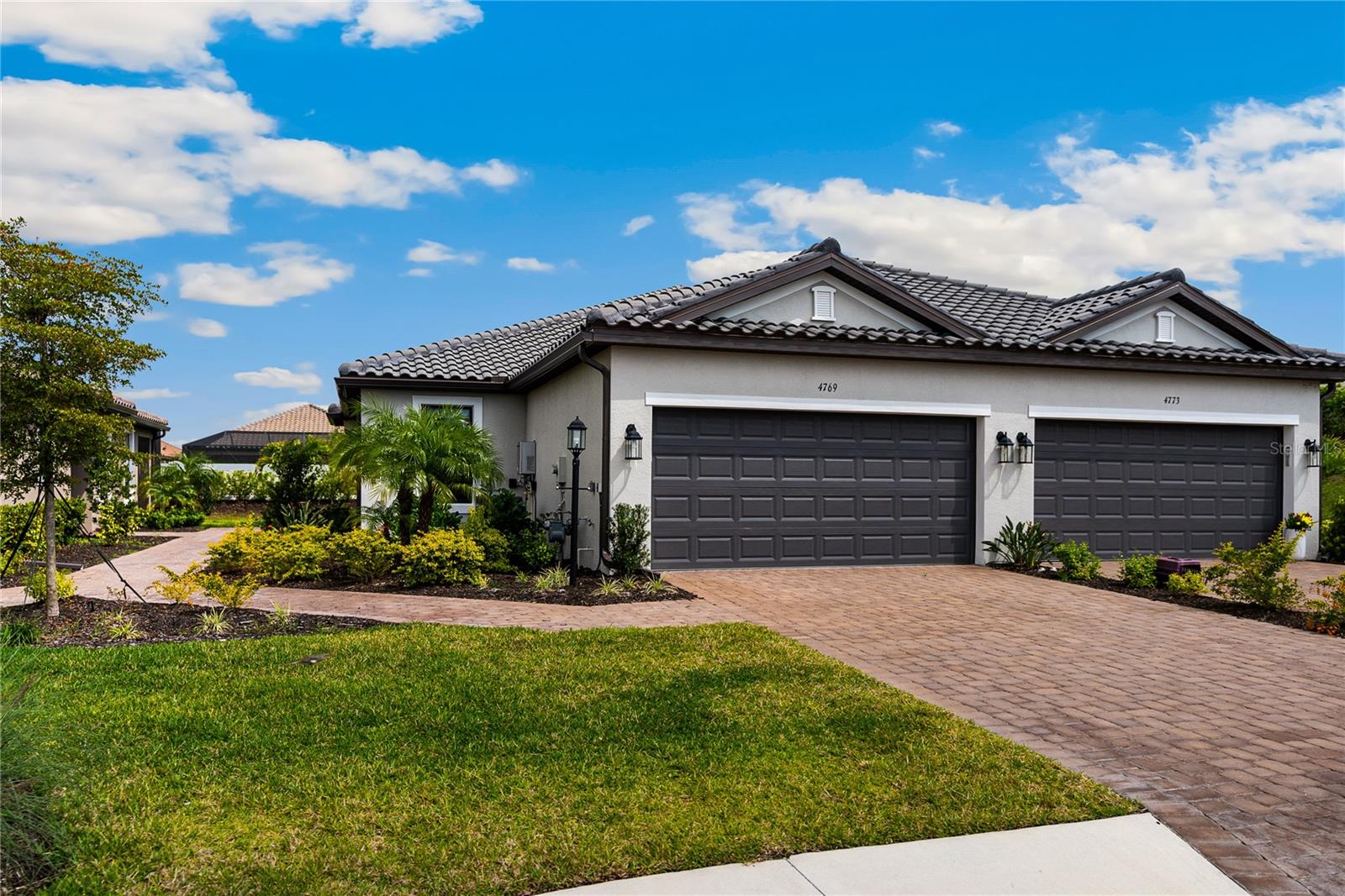This GORGEOUS Ibis Model Villa completed in 2023 is move in ready! There is no need to wait for a new model to be built! This beautiful home has never been lived and has TONS of upgrades! It is located on a premium lot at the end of a cul-de-sac. The details to name a few include tray ceilings throughout the home and 8’ interior doors. The back doors sliders open fully to an extended screened in lanai which leads to a spacious yard that has an added bonus of pre-wire for a pool/spa. The laundry room is also pre-plumbed for a sink. The tile through out the home has a “wood like” feel to them. Both bedrooms have walk-in closets too. Azario at Esplanade is by far the BEST IN CLASS with the amenities offered. Resort style pool, Bahama Bar, fitness center, tennis/pickle bar courts. A luxury Spa located right in the amenities center where you can enjoy an amazing massage and head to the coffee bar “The Toasted Cafe” for a cup of coffee or tea after. For the dog lovers, there are multiple dog parks too! Tons of walking trails for you walkers/runners to enjoy. Top of the line culinary center set to be open at the end of the year will host several restaurants, cooking classes and wine tasting as well as a banquet room. Right up the street around the corner, walking distance from your new home is a small satellite pool as well! This stunning home is ready for move in immediately!! Enjoy resort style living everyday. Some rooms have been virtually staged.
