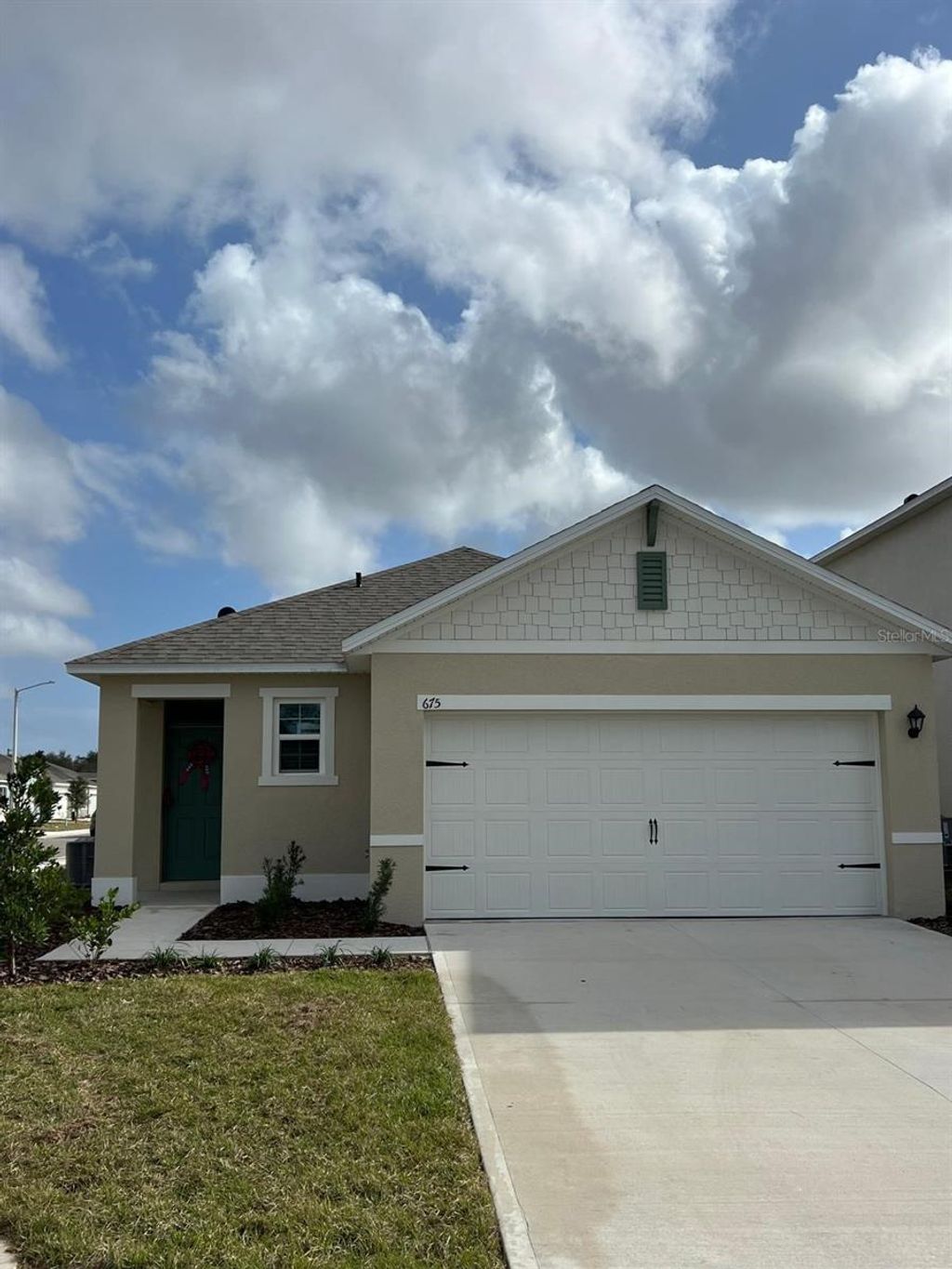 Photo of 675 Park Place Boulevard, Davenport, FL 33837 (MLS # O6390672)