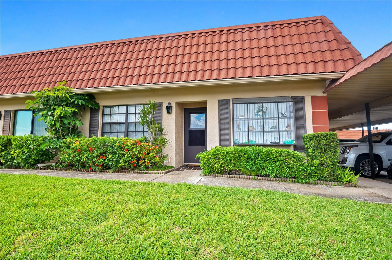 Best location in the community with water views and privacy! This beautifully maintained 2-bedroom, 2-bath single-level villa/condo offers unobstructed canal views in a gated, resort-style community in the heart of Clearwater. Home features include an open floor plan, spacious bedrooms, in-unit laundry, and a private back patio perfect for enjoying sunrises and sunsets. This home has been seasoned with love and is move-in ready with newer AC and water heater—no big-ticket items needed! Never flooded during hurricanes, this is true peace-of-mind Florida living. Enjoy a wide range of community amenities: clubhouse, fitness center, pool, party room, outdoor kitchen, shuffleboard, putting green, billiards, game room, and library. Includes assigned covered parking, private storage unit, and HOA fees that cover cable TV, internet, water, sewer, trash, exterior insurance, and all common areas.
Don’t miss your chance to own one of the best units in the community—schedule your private showing today!