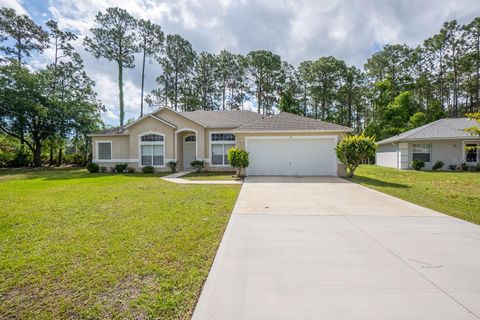 Photo of 27 Red Clover Lane, Palm Coast, FL 32164 (MLS # FC318278)