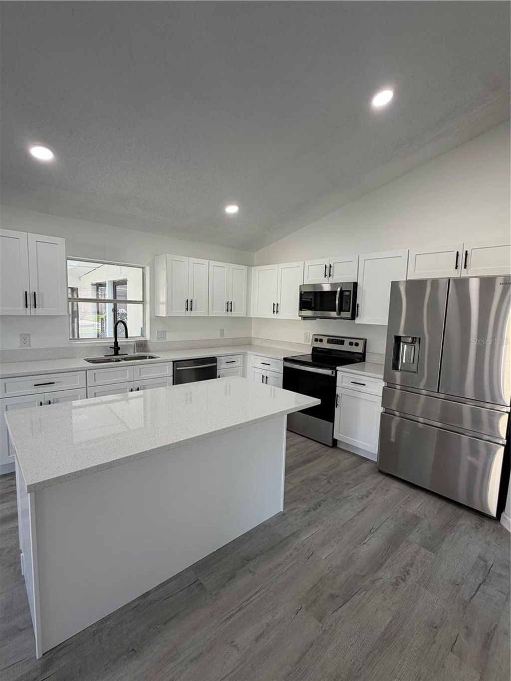 Photo of 303 Silk Oak Dr, Kissimmee, FL 34743 (MLS # O6408237)