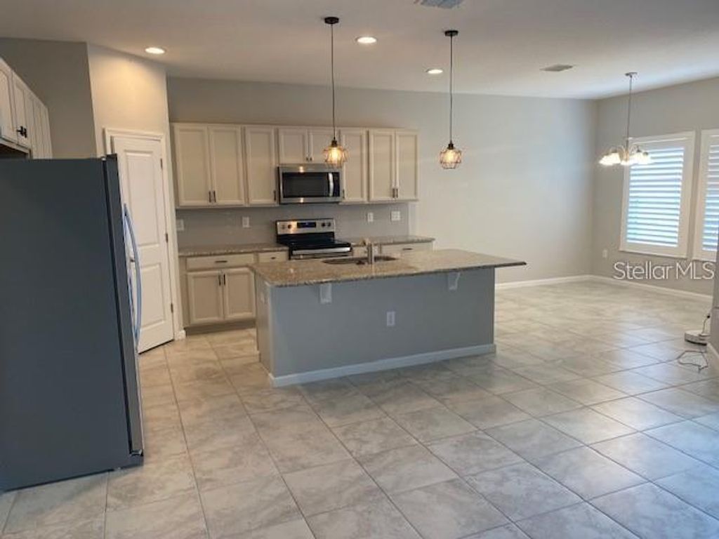 Photo of 584 Disa Drive, Davenport, FL 33837 (MLS # S5150313)
