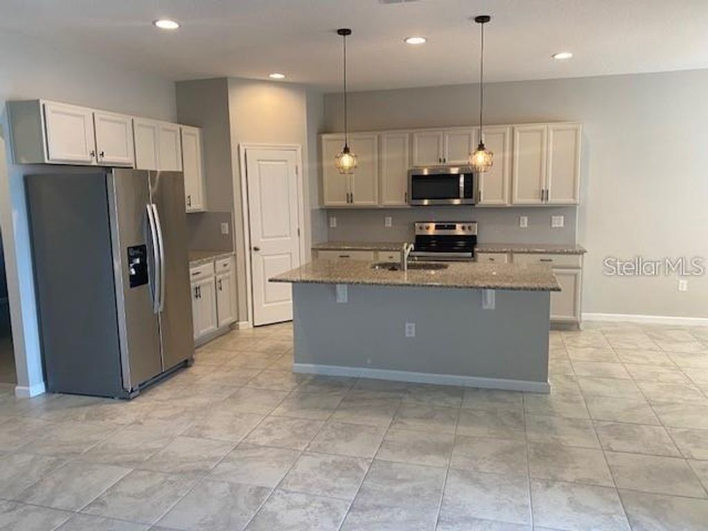Photo of 584 Disa Drive, Davenport, FL 33837 (MLS # S5150313)