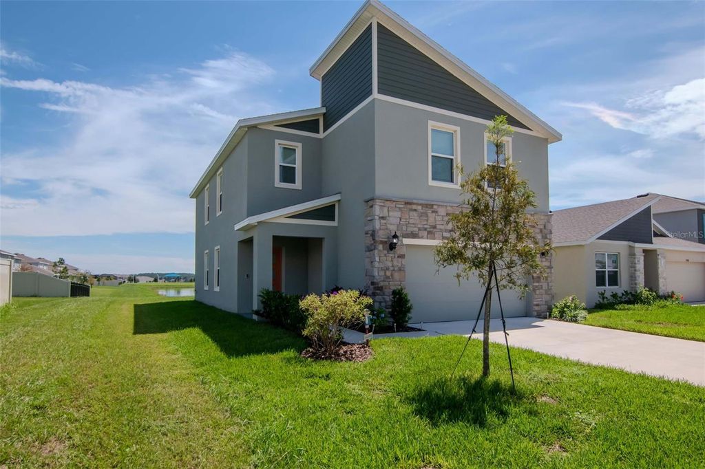 Photo of 9744 Crescent Ray Drive, Wesley Chapel, FL 33545 (MLS # TB8461074)