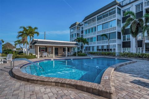 A home in BELLEAIR BLUFFS