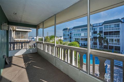 A home in BELLEAIR BLUFFS