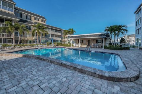 A home in BELLEAIR BLUFFS