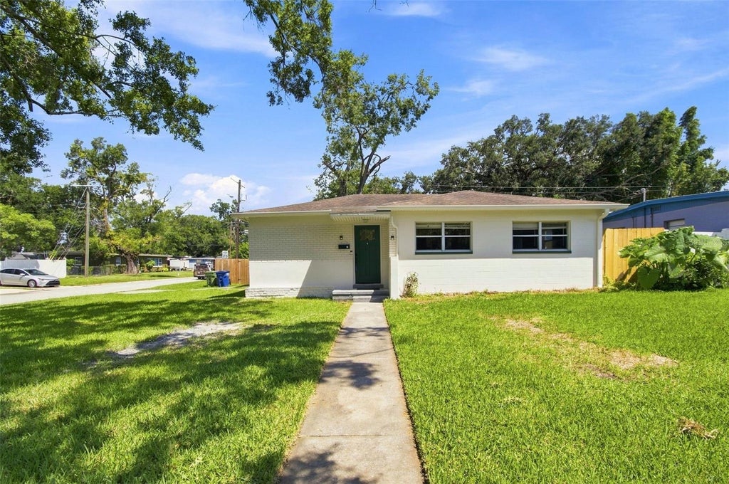 Photo of 2002 E Hamilton Avenue, Tampa, FL 33610 (MLS # TB8542011)