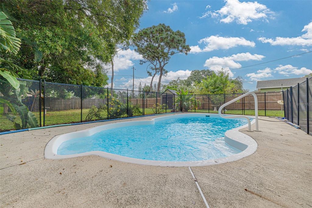 Photo of 1358 Admiral Woodson Lane, Clearwater, FL 33755 (MLS # TB8419948)