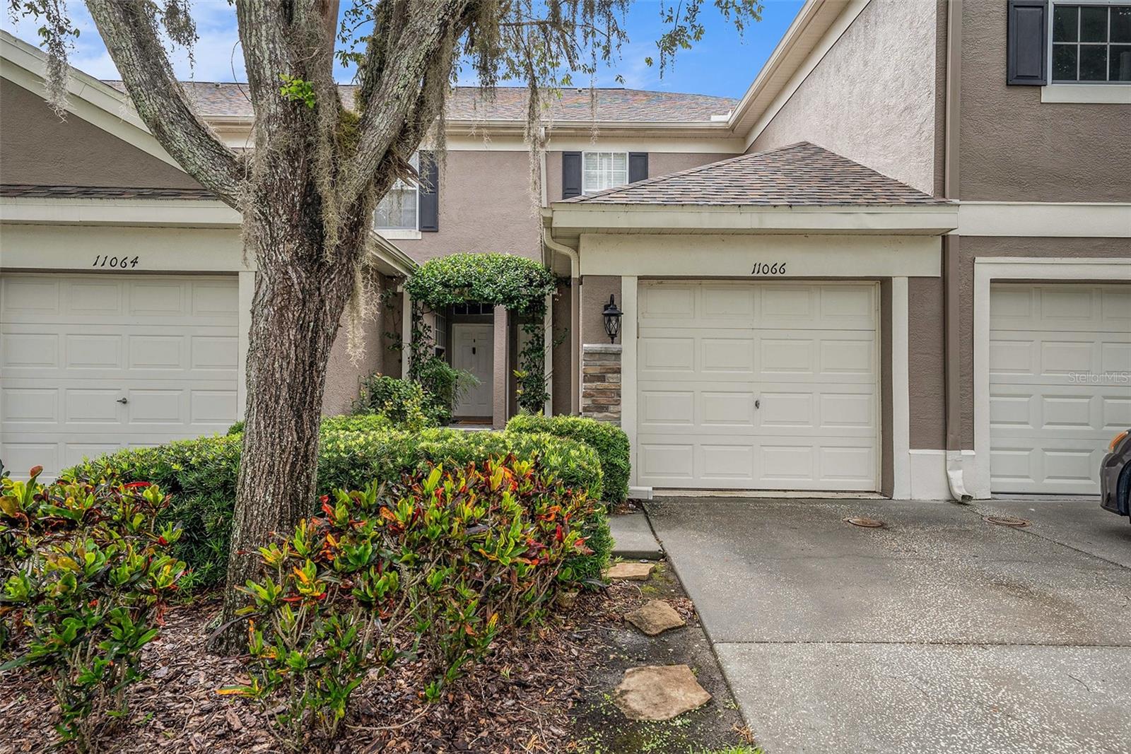 Welcome home to this fabulous 2 bed/2.5 bath/1 car garage townhome in the Westchase area. Wide plank wood-style tile flooring on the first floor; Wood upstairs. Stainless appliances, Granite in kitchen and baths. UPGRADED lighting, custom trim and crown molding. Great closet space. SCREEN LANAI with peaceful views of the CONSERVATION. You're going to love this! Windsor place is in a great Westchase location. Walk to top rated Deer Park Elementary, walk to the Library. Great shopping nearby. Less than 20 minutes to the airport and 45 minutes to the beaches. What more could you ask for? Cable/internet is included in the HOA.