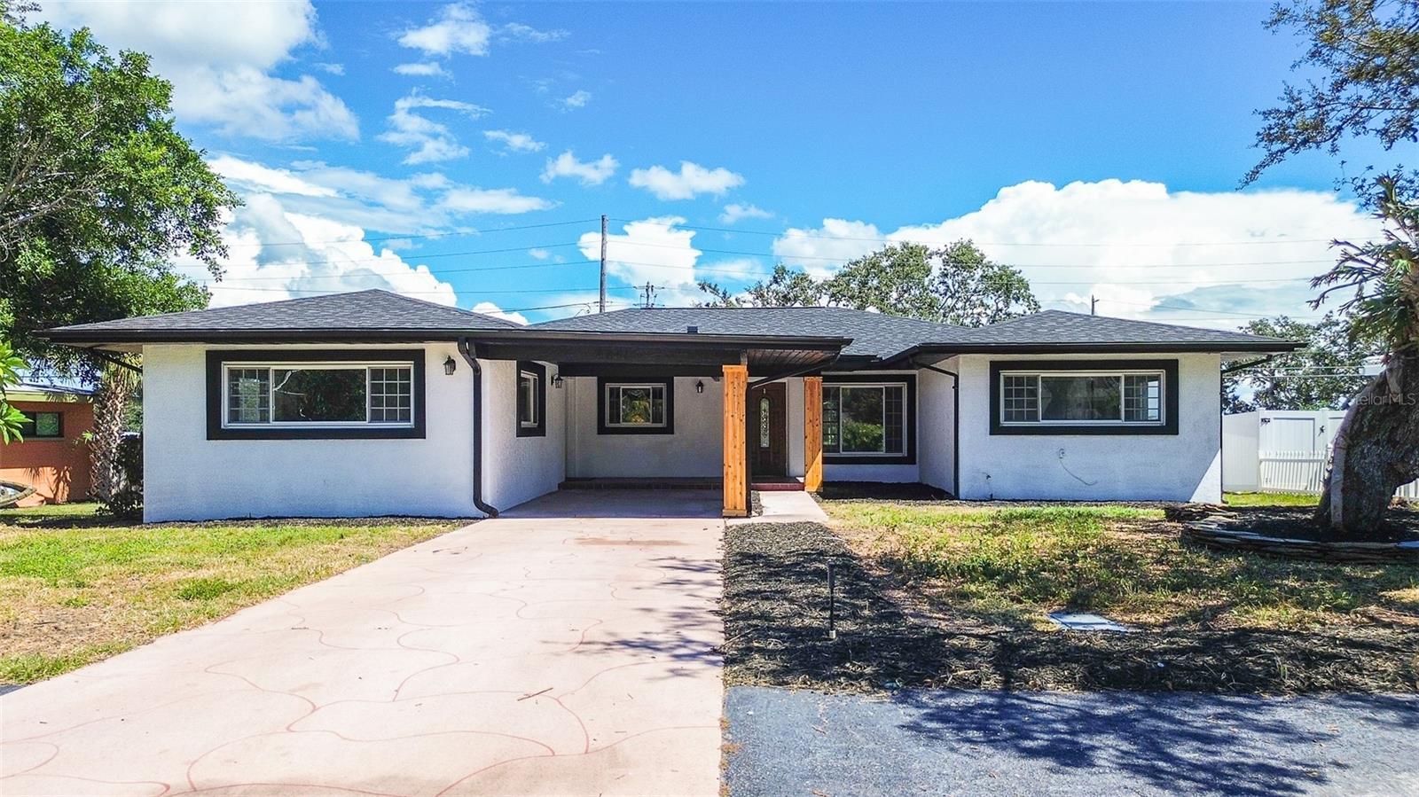 Welcome to 4841 108th Street N in St. Petersburg, Florida! This spacious, well-maintained and newly renovated home offers over 2,500 sq. ft. of living space. Built in 1955, this home combines solid construction with thoughtful updates for today’s lifestyle.
Inside, enjoy a bright 16x23 living room, a functional kitchen with all new modern appliances, and an adjacent dining area. With 3 bedrooms, 2 bathrooms, a flex room and a 14x24 bonus room, there’s plenty of flexibility whether you need a home office, gym, or extra entertaining space. The bedrooms are generously sized, including a comfortable primary suite with ensuite bath and plenty of space for a creative retreat.
Additional highlights include durable vinyl flooring, a fenced yard and carport parking. The 8,111 sq. ft. lot is easy to maintain while still offering space for gardening, pets, or outdoor living. Best of all, the home is not in a flood zone and has no HOA and no CDD. Move-in ready and perfectly located near shopping, dining, and the Gulf beaches, this home offers comfort, flexibility, and peace of mind.