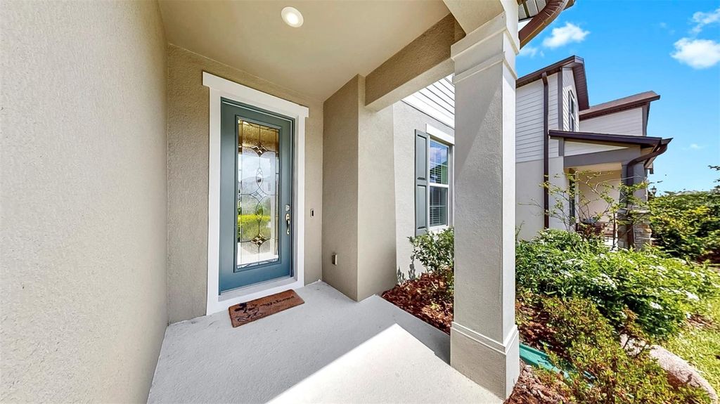 Photo of 9293 Rally Spring Loop, Wesley Chapel, FL 33545 (MLS # TB8390164)