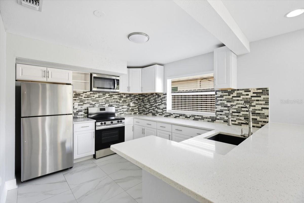 6715 S MASCOTTE STREET