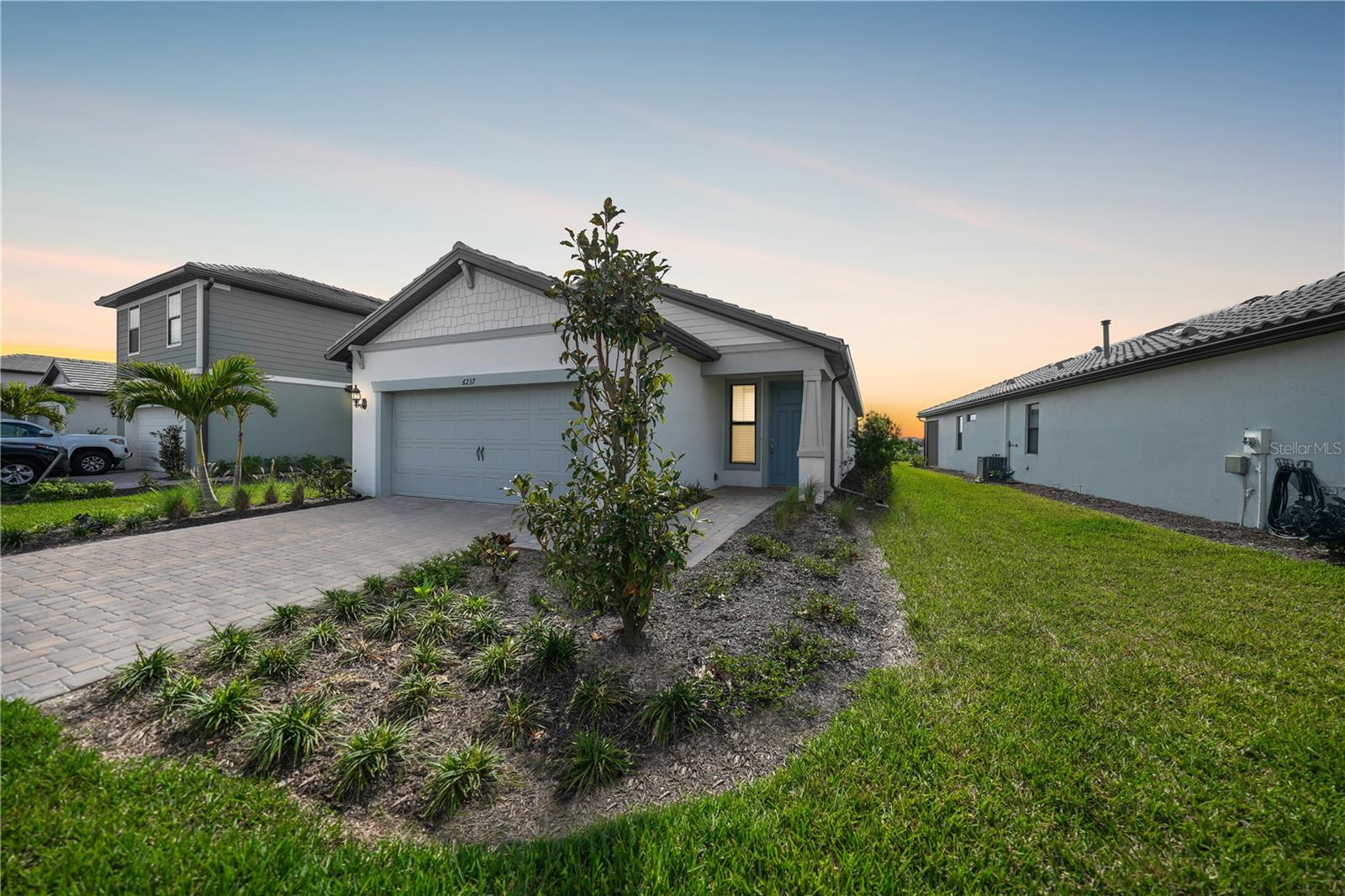 Seller offering a $10,000 credit for closing costs or interest rate buy-down. This stunning three-bedroom, two-bathroom home in Talon Preserve on Palmer Ranch offers a blend of modern elegance and natural beauty. Built in 2023 with a durable tile roof, this home is designed for comfort and style. Featuring a $35,000 lot premium and $82,000 in upgrades, every detail has been thoughtfully curated for luxury living.
The oversized two-car garage with a new epoxy floor, measuring 24 feet deep, provides plenty of storage space. Inside, 10-foot ceilings and hurricane-impact doors and windows create a bright and secure living environment. Upgraded features include tile flooring throughout, 5 1/4" baseboards, and 8-foot doors, and so many more. The kitchen is both stylish and functional, featuring 42-inch upper cabinets with crown molding, stainless steel appliances, quartz countertops, drawer base cabinets, a tile backsplash, pendant lighting, and seating at the island.
The great room is filled with natural light from transom windows and sliding glass doors that lead to the extended lanai. The primary suite is a peaceful retreat with large windows overlooking the preserve. Its ensuite bathroom includes a spacious vanity with dual sinks, quartz countertops, a walk-in shower with frameless glass doors, a built-in bench, and floor-to-ceiling tile with a decorative listello band. The additional bedrooms are generously sized, with the third bedroom featuring French doors.
Talon Preserve is a gated, natural gas community with exceptional amenities, including a resort-style heated pool with a rock wall feature, beach entry, and a lap lane. Residents also enjoy a heated spa, splash pad, full-service restaurant (opening March 2025), an 18,000 sq. ft. clubhouse with event spaces, a fitness center, pickleball, tennis, and bocce ball courts, a playground, firepit lounge, and a dog park.
Conveniently located, this home is just half a mile from Oscar Scherer State Park, offering miles of hiking and biking trails, fishing, and other outdoor activities. It’s less than 10 miles from the white sand beaches of Siesta Key and Nokomis Beach, and approximately 15 miles from St. Armands Circle and downtown Sarasota’s dining and shopping. Everyday conveniences, including Publix, are just minutes away.
This is a great opportunity to own a beautifully upgraded home in one of Nokomis's most sought-after communities.
