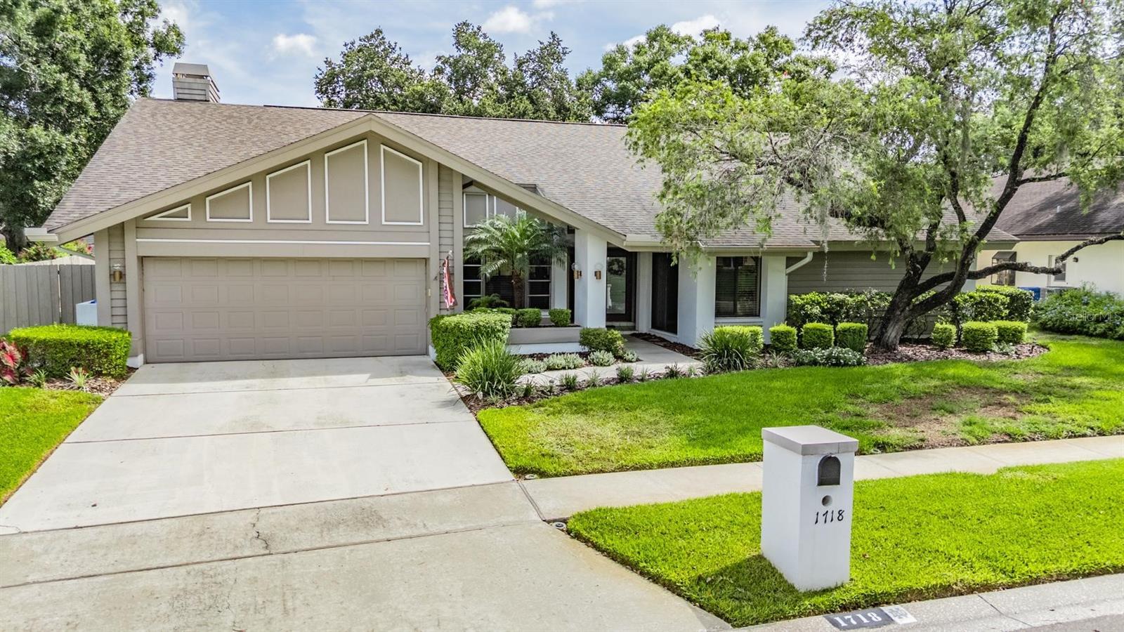Welcome home to Lake Magdalene Manors, where tree-lined streets, friendly neighbors, and a true sense of community create the perfect backdrop for this beautiful 4-bedroom, 2.5-bath pool home. Situated on a large, fenced lot, this home was made for both everyday comfort and unforgettable gatherings.
As you step inside, a welcoming layout greets you with a formal dining room to your left—ready for holiday dinners and celebrations—and a formal living room to your right, perfect for morning coffee or quiet conversations. Just beyond, a bright front bedroom makes an ideal home office or guest room, complete with a convenient half bath.
The primary suite is your private retreat, featuring tall ceilings, sliders that open directly to the pool, and a spacious ensuite with bold blue tile accents that add a touch of charm and character. On the opposite side of the home, the heart of the house awaits—a chef’s kitchen designed for connection. With a six-foot island, two ovens, white cabinetry, stainless steel appliances, and a serving window to the patio, this space is ready for Sunday brunches, family pizza nights, and everything in between. The kitchen overlooks a warm and inviting family room, complete with a floor to ceiling wood-burning fireplace, wet bar, and vaulted ceilings that fill the space with natural light.
Step outside and picture weekends spent hosting pool parties, grilling by the outdoor kitchen, or relaxing under the covered patio while friends and family splash in the pool. The large fenced yard is perfect for pets, playtime, and Florida evenings under the stars.
Two additional bedrooms and a full bathroom are tucked away for privacy, making this split floor plan ideal for guests or family. The spacious laundry room is located down the hall with room for all of your extra storage. With a 2-car garage and a location just minutes from shopping, dining, and top-rated schools, this home is as convenient as it is charming.
Whether you’re hosting the holidays, taking evening walks beneath the oaks, or simply soaking up the sunshine by the pool, this Lake Magdalene Manors home offers the vibe you’ve been dreaming of. IT'S NOT JUST A HOME...BUT A LIFESTYLE!