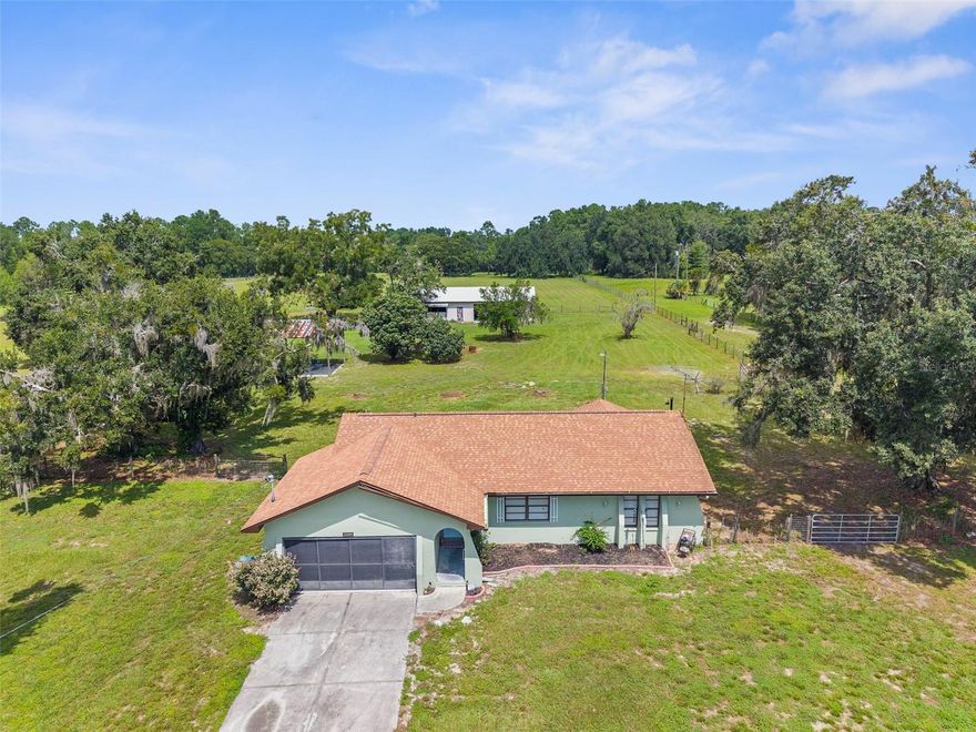 Discover the perfect blend of comfort and country living on this fully fenced 10-acre AG-zoned property. The 2-bedroom, 2-bath home offers 1,110 heated square feet and a total of 1,713 square feet under roof, providing a welcoming space with plenty of natural light and functionality.
A highlight of the property is the 1,120 sq. ft. detached garage, complete with 220 amp service—ideal for welding, a workshop, or heavy-duty projects. For equestrian enthusiasts, the property features a 5-stall horse stable and ample pasture, making it move-in ready for horses or livestock.
With wide-open acreage, secure fencing, and versatile outbuildings, this property is perfectly suited for hobby farming, equestrian pursuits, or building out your dream homestead.
Whether you’re seeking a peaceful retreat, a working farm, or simply extra space to spread out, this property offers unlimited potential.