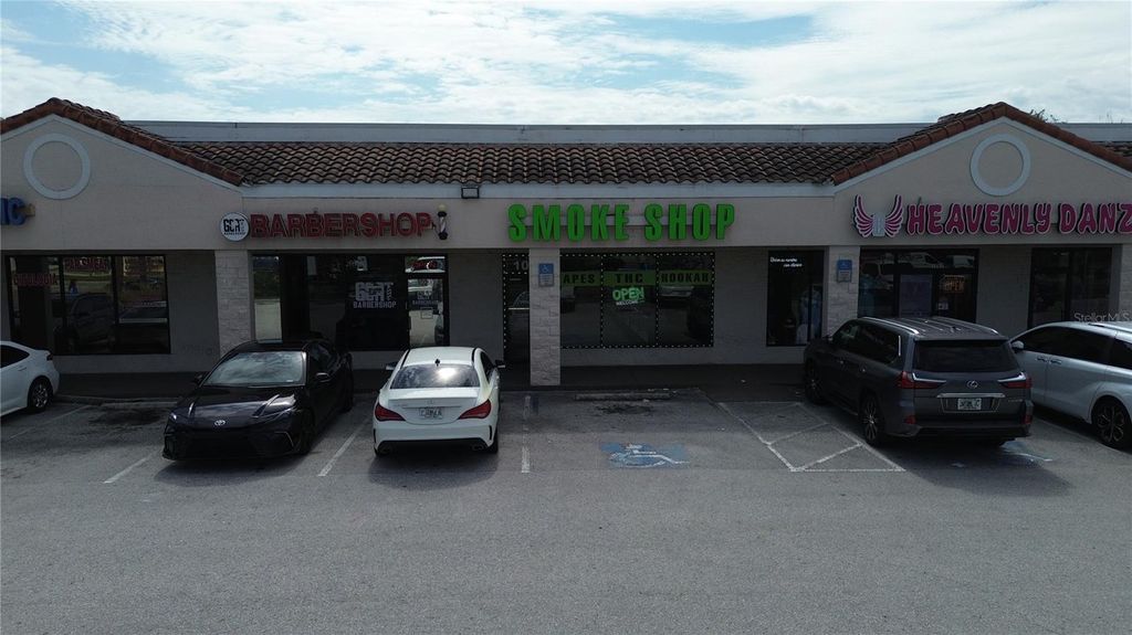Photo of 11601 S Orange Blossom Trail #103, Orlando, FL 32837 (MLS # G5115079)