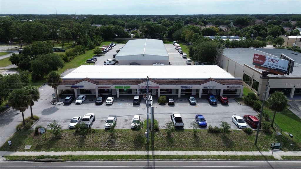 Photo of 11601 S Orange Blossom Trail #103, Orlando, FL 32837 (MLS # G5115079)