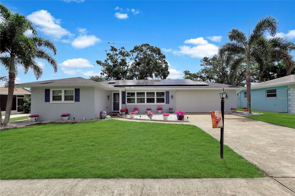 Photo of 3260 Parkway Place, Palm Harbor, FL 34684 (MLS # TB8438213)