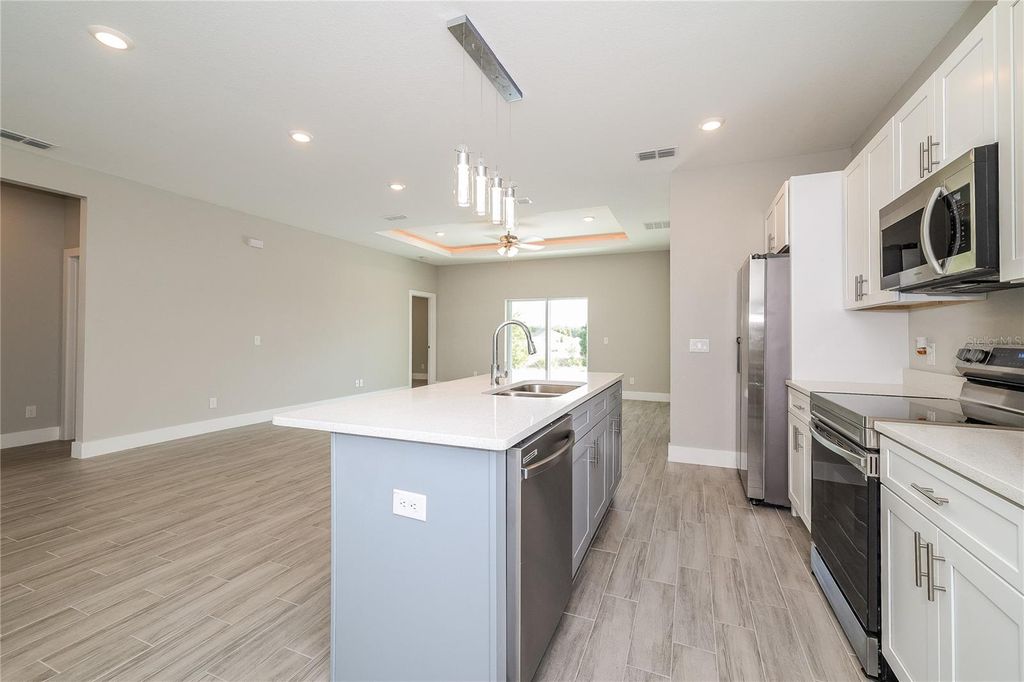 Photo of 1055 Desmoines Lane, Poinciana, FL 34759 (MLS # C7523249)