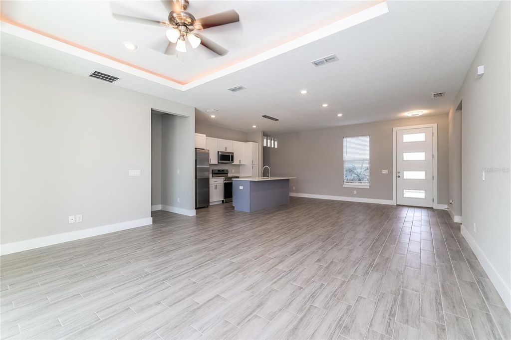 Photo of 1055 Desmoines Lane, Poinciana, FL 34759 (MLS # C7523249)