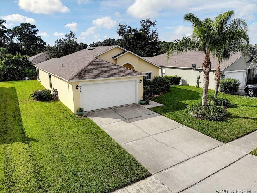 WELCOME HOME! Come and live the Florida lifestyle that you and your family have been dreaming of in this immaculate, like new, family 3 bedroom 2 bath home in the charming Majestic Oaks community in Edgewater Florida. The fantastic open floor plan with fully tiled large eat-in kitchen makes this home perfect for entertaining family, friends, and neighbors. Enjoy your newer SS appliances, vaulted ceilings throughout with updated lighting and ceiling fans making this home move-in ready for you and your family. Relax and enjoy your spacious 15x13 master suite w/ walk-in closet, elegant master bath w/ dual sinks, walk-in shower, & soaker tub.  The split bedroom living plan affords plenty of space for the children, grandkids, or your home office. Your meticulously maintained dream home includes many upgrades, including luxurious Armstrong laminate wood floors, reverse osmosis water system in the kitchen, ADT alarm system, 2 attic storage areas, upgraded insulation, new exterior paint, 1 year new well for sprinklers, and 2017 âNew Southâ Lifetime warranty 140 MPH rated windows and for extra protection and insurance savings, full home hurricane panels. Nature is right outside your door in your tranquil backyard including a fully screened 10x16 porch and custom brick pavered BBQ area for quiet evenings and neighborhood BBQs.  Proximity to shopping and restaurants compliment this quaint community with room to walk the pets, exercise, or mingle with your friendly neighbors.LOOK NO MORE, BECAUSE YOU HAVE FOUND YOUR DREAM HOME AT 226 TREE BRANCH IN MAJESTIC OAKS. ;Water: City
