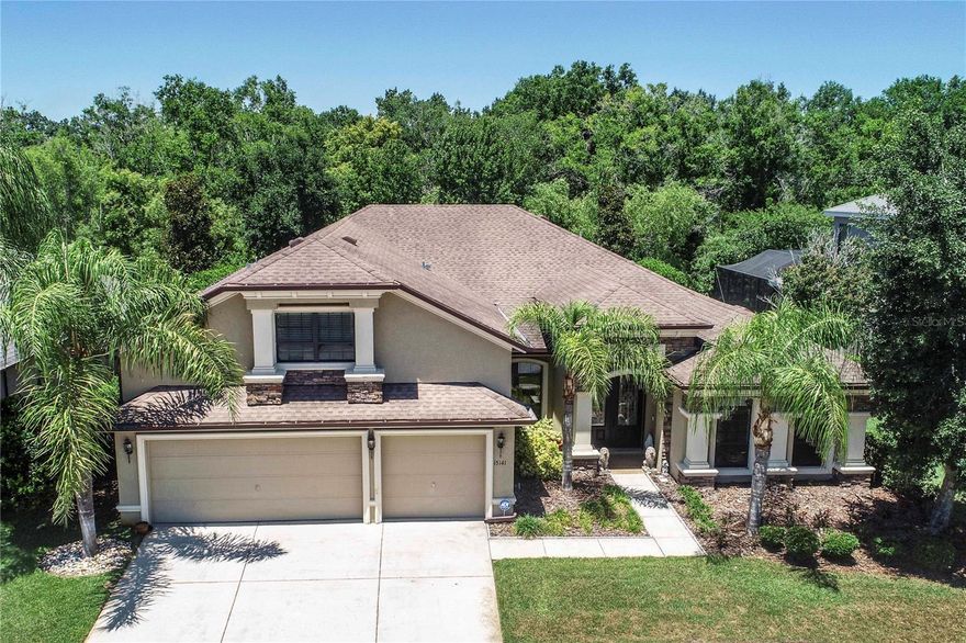 Welcome to this stunning custom built pool home offering the perfect blend of luxury, privacy, and the vibrant Florida lifestyle. With 3,333 sq. ft. of heated living space (4,185 total), this spacious 4 bedroom, 3 bath residence with 3 car garage, dedicated office, and an upstairs bonus room is designed for families who love to live, play, and entertain. Step inside to find beautiful bamboo hardwood floors in the living room, dining room, primary suite, and primary closet, complemented by vinyl flooring in bedrooms 2 and 3 and engineered hardwood in bedroom 4. Upgraded fixtures throughout the home add a refined touch. The gourmet kitchen is a chef’s delight, featuring double built in ovens, glass cooktop, microwave, granite countertops, cherrywood cabinetry, and a custom built in dining bench with storage—perfect for family meals and gatherings. The backyard is a true private oasis. Enjoy a custom saltwater pool with jacuzzi, decorative waterspouts, and a new heater (2026) that can warm both the spa and the entire pool. With no backyard neighbors, a fenced yard, and serene wooded views, this space is ideal for relaxing weekends and outdoor fun. Mature shrubs along both sides of the property provide added privacy.
Additional features include:
• New A/C (Dec. 2022)
• Gated, guard secured community
• Top rated schools
• Community tennis courts, volleyball courts, and children’s park
• Minutes from major roads, dining, and everyday conveniences
• Three major shopping malls within 30 minutes
• Approximately 30 minutes to Tampa International Airport and 45 minutes to Florida’s world class beaches
This home offers the space, amenities, and location active families crave—whether you’re hosting pool parties, enjoying community sports, or exploring everything the Tampa Bay area has to offer. A rare opportunity to live the Florida lifestyle at its finest. The gourmet kitchen is a chef’s delight, featuring double built in ovens, glass cooktop, microwave, granite countertops, cherrywood cabinetry, and a custom built in dining bench with storage—perfect for family meals and gatherings. The backyard is a true private oasis. Enjoy a custom saltwater pool with jacuzzi, decorative waterspouts, and a new heater (2026) that can warm both the spa and the entire pool. With no backyard neighbors, a fenced yard, and serene wooded views, this space is ideal for relaxing weekends and outdoor fun. Mature shrubs along both sides of the property provide added privacy.