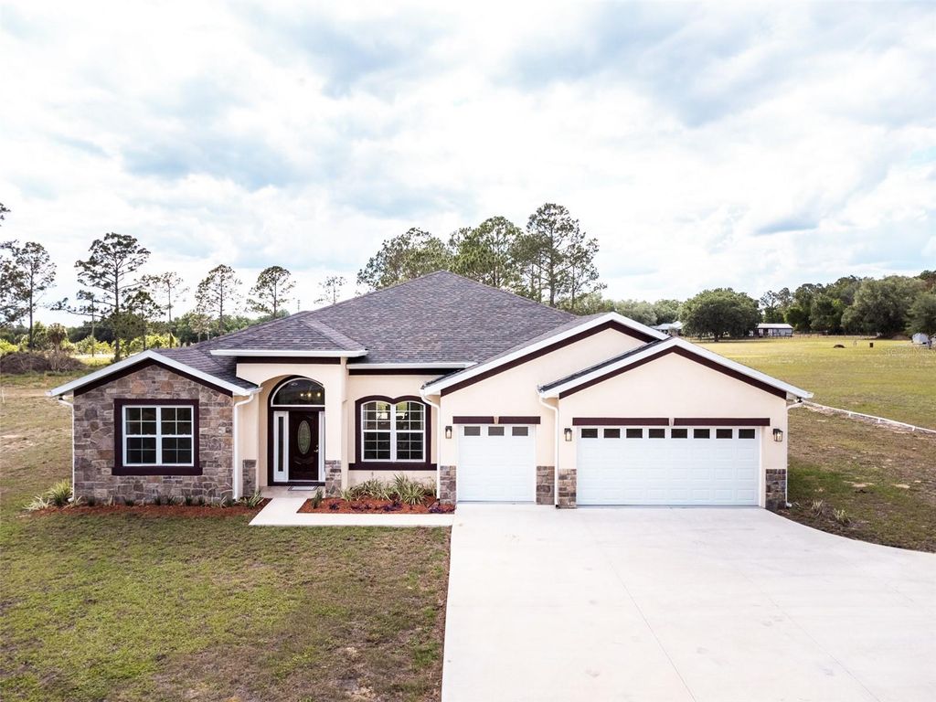 Photo of 41289 County Road 452, Leesburg, FL 34788 (MLS # V4948613)