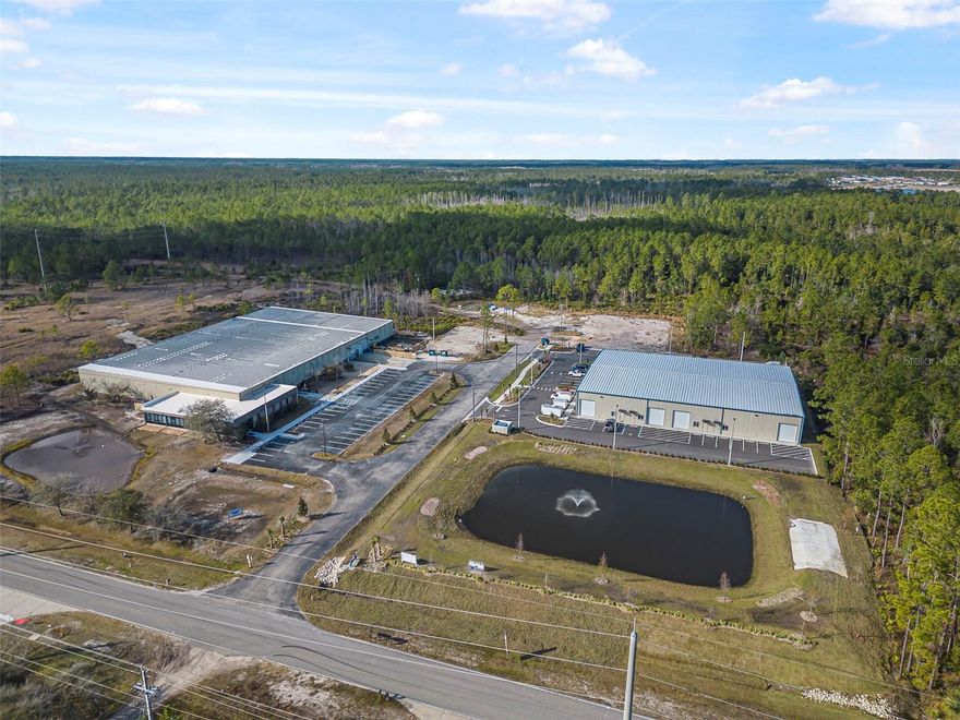 32 Hargrove Grade is situated in Palm Coast, Florida, within the Hargrove Industrial Park. It is 5 acre parcel with a 48,754sf building leased to AMRAD Manufacturing-a manufacturer of motor run capacitors.  The current tenant is in a 5 year lease and will renew for an additional five year term.  The tenant is responsible for all maintenance, real estate taxes and insurance for the property. This location offers convenient access to major routes such as US Highway 1, Interstate 95, and Palm Coast Parkway, facilitating efficient transportation and connectivity.
The Hargrove Industrial Park comprises multiple buildings designed for industrial use. For instance, nearby properties like 24 Hargrove Grade feature steel construction with 14-foot high roll-up doors, office spaces, and restrooms. These facilities are tailored to accommodate various industrial and commercial operations. 
Palm Coast is a rapidly growing city located along Florida's Atlantic coast. As of 2024, the city has an estimated population of approximately 106,000 residents. The median age is around 50.3 years, reflecting a community with a significant number of working professionals. The local economy is diverse, with key employment sectors including healthcare, retail trade, accommodation and food services. The city's strategic location between Jacksonville, Orlando, and the Space Coast provides businesses with access to a highly educated and skilled workforce. 
In terms of accessibility to major cities, Palm Coast is located approximately 60 miles south of Jacksonville and about 90 miles northeast of Orlando.