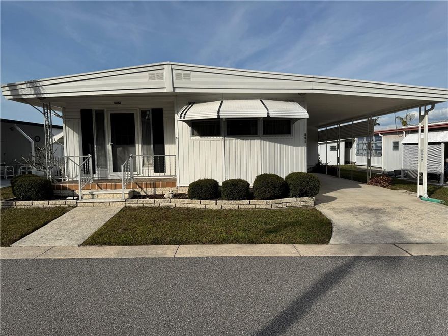 Welcome Home to Beautiful Country Park, a 128-unit, vibrant 55-Plus Manufactured Home Community located in Clearwater, Florida. This is a Resident Owned Co-Op with many fine features. Country Park was named “Community Association of the Year – 2024. This charming 2-bedroom, 2-bathroom home offers comfortable and spacious living. The home is situated in the back half of the park walking distance to the pool and clubhouse. The interior of this home is spacious. It has a large living area with a separate dining room. The kitchen has plenty of counter space and a movable island/sitting space. The bedrooms are large with plenty of closets. The kitchen is equipped with lots of storage. This home is welcoming and warm. There is new vinyl flooring throughout and a newer A/C unit. Country Park is a great place to call home, as it offers a variety of amenities and activities that cater to the residents. They can enjoy the use of the clubhouse, swimming pool, and shuffleboard courts, and take part in a variety of social events and activities. This is a wonderful opportunity to own a beautiful and comfortable home in a fantastic 55 Plus community in Clearwater, Florida. This Co-0p has a share that is valued at $40,000 and it is included in the sale price. The HOA approval process is required to purchase. Call today to schedule your personal tour.