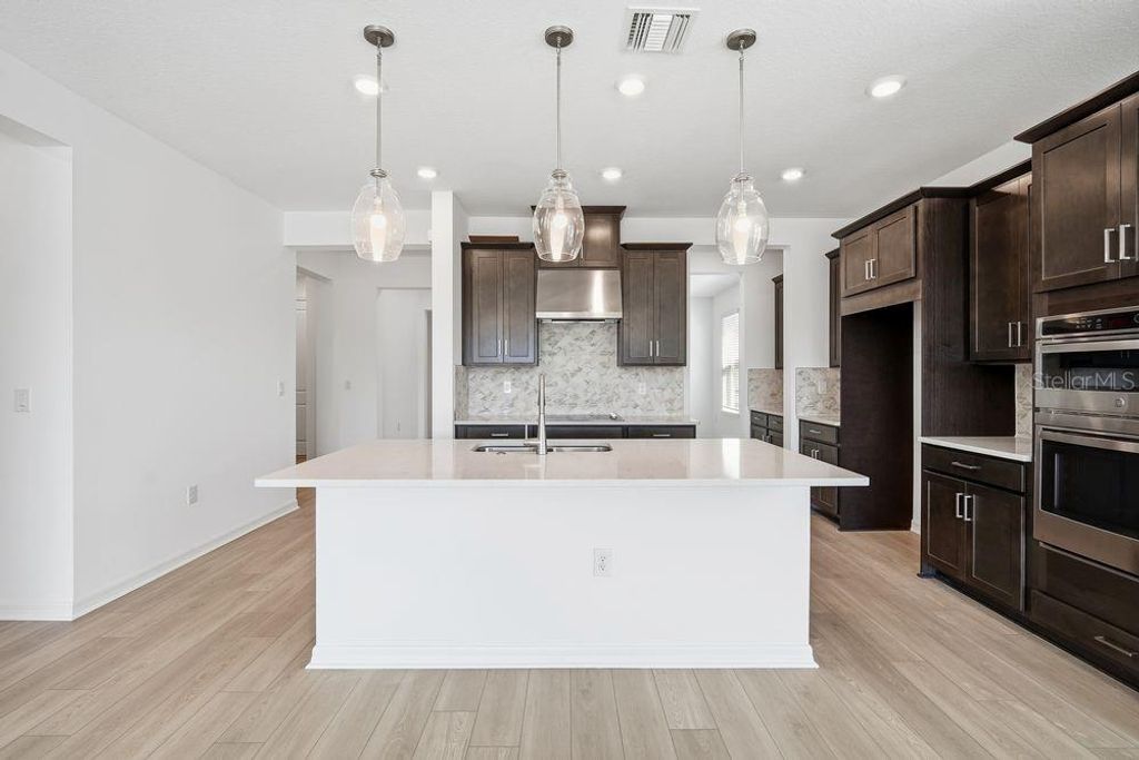 Photo of 2257 Cypress Creek Street, Auburndale, FL 33823 (MLS # TB8407087)