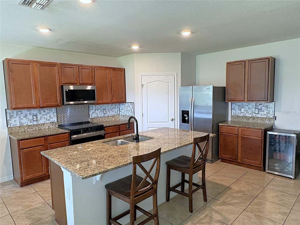 Photo of 1116 Fox Path Road, Davenport, FL 33837 (MLS # C7528162)