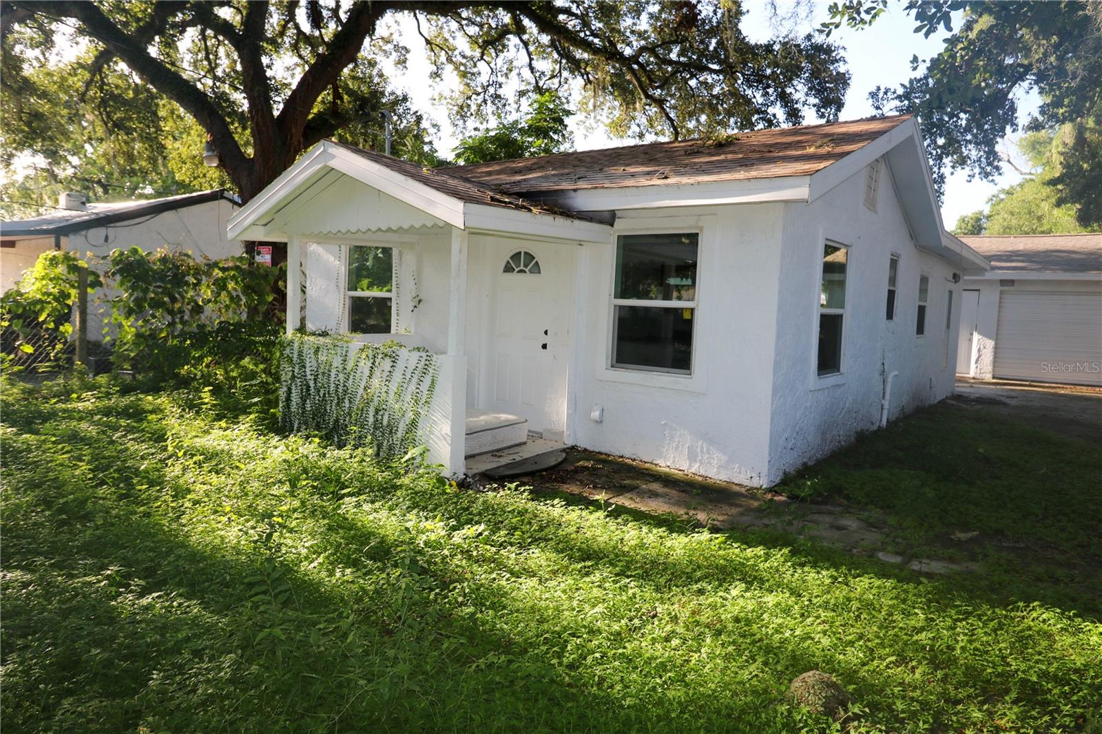 Fully renovated home featuring a brand-new roof, brand-new air conditioning, fresh paint throughout, a completely updated kitchen with all-new appliances, and brand-new flooring. This stunning property is ready for its first owner!