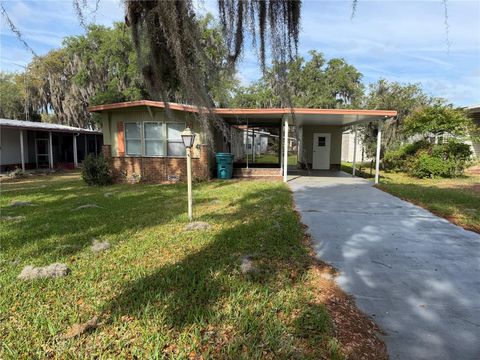 Photo of 5562 Lansing Drive, Wildwood, FL 34785 (MLS # TB8492496)