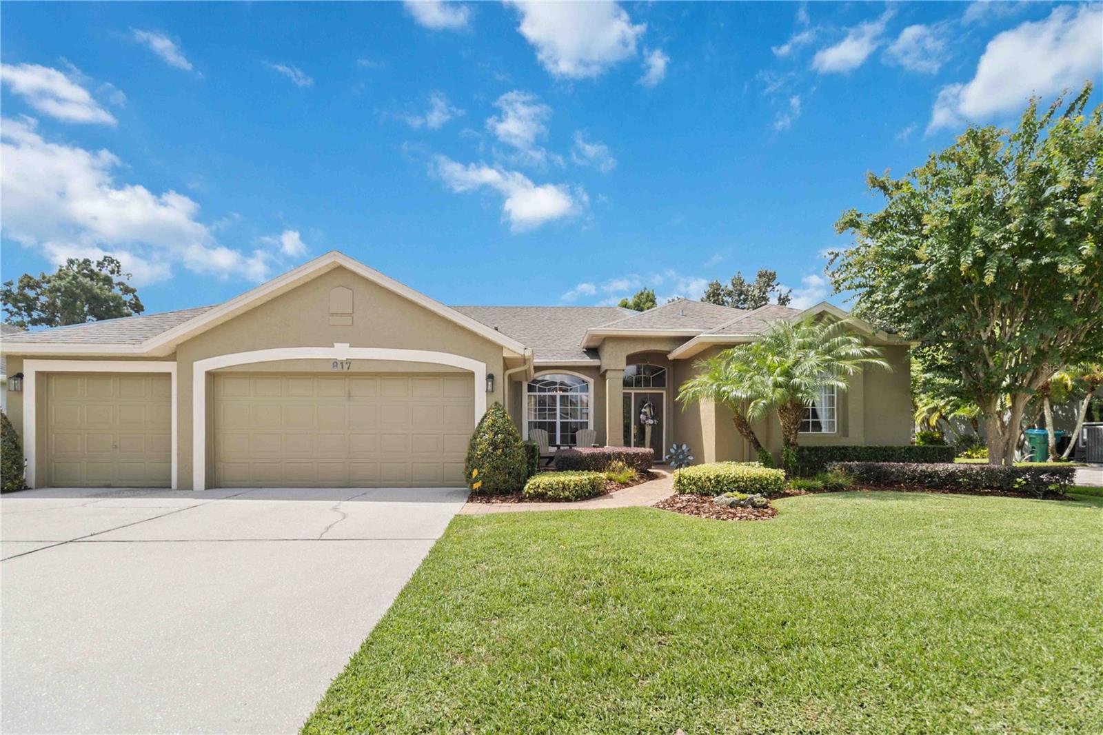 Tranquil views of the pond and pool welcome you the moment you step through the glass entry door of this 4-bedroom, 3-bath, 3-car garage home in the highly sought-after Winding Hollow community of Winter Springs. (Please open video tours) The tree lined entrance and manicured lawns make a great first impression. While this three-way split plan offers functionality, the panoramic pond view brings a sense of peace and serenity to the home from the kitchen, breakfast nook, primary suite, and living room. The foyer opens to both the formal dining and living rooms, setting the tone for the home’s inviting layout. At the heart of the home is a spacious updated kitchen with 42” upper cabinets, gorgeous and generous granite counter space, two pantries with pull-out shelves, breakfast bar, and newer stainless steel appliances, including a French door refrigerator. The sunlit breakfast nook, with sliding doors to the screened pool and lanai, is the perfect spot to start your day. The large family room flows seamlessly from the kitchen, ideal for relaxed living and entertaining. Two bedrooms on one side of the split share an adjacent full bath, while a private fourth bedroom—on the other side of the home, with its own hallway and bath, also accessible from the pool—makes an ideal guest or in-law suite. The primary suite, tucked away for privacy from the others, features two walk-in closets, a garden tub , walk-in shower, dual vanities and a separate water closet. Soaring ceilings in the dining and living rooms add architectural charm. Home has no carpet, completely tiled. From the garage enter the indoor laundry room with washer & dryer that will stay with the home. Practical updates include Leaf Filter gutter protection, re-plumbing in 2025; Roof 2017; Water Heater 2024; HVAC 2017. These original owners have had the pool and A/C professionally maintained over the years as well as pest control, lawn and landscape. The exterior was painted in 2021 and the pool deck has a fresh coat of paint. Located in an A-rated school district near Winter Springs Town Center, restaurants and shops, this community offers bike and jogging trails, a sports complex with Pickle Ball courts, A+ schools and more. Convenient to I-4, and the 417—this home blends beauty, comfort, and convenience. Great location, amazing home and move in ready! Don't wait...must see! Schedule your private showing today!