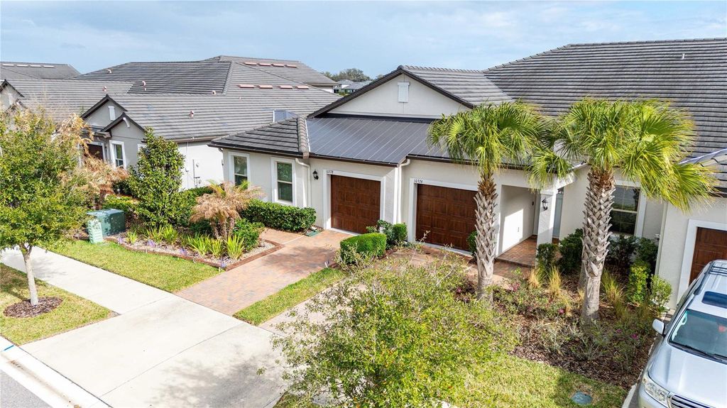 Photo of 10374 Echo Dock Loop, San Antonio, FL 33576 (MLS # TB8483242)