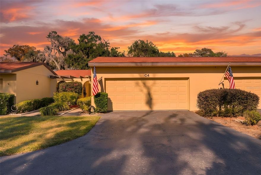 One or more photo(s) has been virtually staged. Welcome to Fair Oaks Condominium, one of the most desirable communities in Eustis, where the stunning views of Lake Eustis truly steal the show. As one of the premier features of this home, the beautiful Florida room offers breathtaking lake views that simply can’t be beat...an ideal spot for morning coffee, peaceful afternoons, and enjoying the tranquil lakefront scenery. Inside, this spacious 2-bedroom, 2-bath condo is filled with natural light enhanced by skylights, and the warm, inviting stone fireplace creates a charming focal point in the main living area. Luxury vinyl plank flooring flows throughout much of the home, while the guest bedroom features cozy carpeting along with a built-in Murphy bed, desk, and storage - perfect for guests, hobbies, or a home office. The primary suite is thoughtfully designed with relaxing lake views, an ensuite bath with walk-in shower and single vanity, and a generous walk-in closet complete with built-in organization, offering both comfort and functionality in one inviting space. With three convenient entry and exit points, daily living is easy, and the oversized 2-car garage provides plenty of storage for vehicles, tools, or lake toys. Outside, you’ll love the large 22' x 11' courtyard-style patio—an open-air space perfect for grilling, relaxing, container gardening, or simply enjoying Florida’s beautiful weather. The kitchen features timeless white cabinetry paired with durable Corian countertops for classic style and everyday practicality. Living here means embracing the very best of Central Florida. You’re just minutes from Historic Downtown Eustis with lakeside parks, restaurants, shopping, festivals, and the marina. Enjoy the incredible Harris Chain of Lakes lifestyle with boating, fishing, and waterfront dining close by. Mount Dora’s charm is just a short drive away, and with convenient access to major roadways, Orlando, and the beaches, getting wherever you need to go is easy and efficient.
If lake views, lifestyle, and low-maintenance living are at the top of your wish list, this Fair Oaks condo delivers in every way.