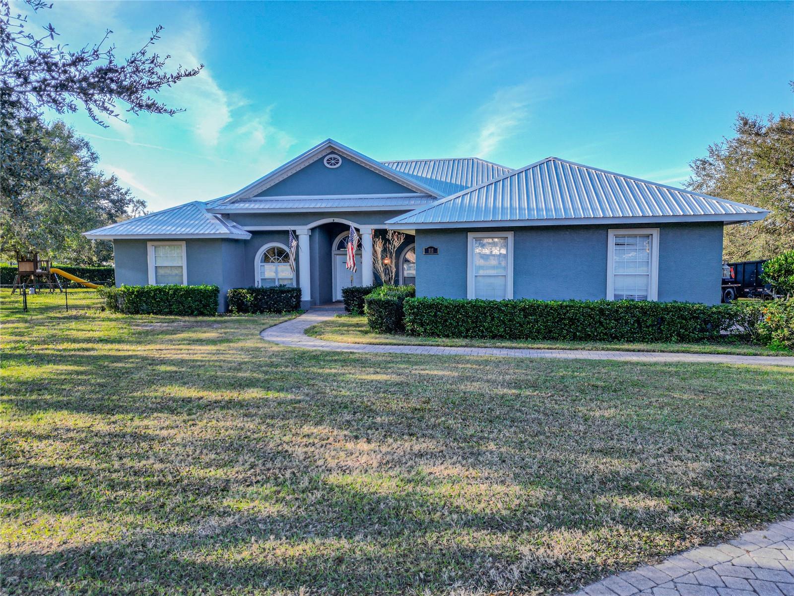 Motivated Seller, Bring All Offers!
Welcome to 111 Arbor Way, Auburndale, FL 33823 – a beautifully upgraded 4-bedroom, 3.5-bathroom home offering 2,772 sq ft of living space on a rare 0.97-acre lot in a USDA loan eligible area. With solar panels to be fully paid off at closing, providing the potential for virtually no power bill during some months of the year, new spray foam insulation for maximum energy efficiency, and a host of modern updates, this home is truly move-in ready and designed for comfort and sustainability.
Recent upgrades include a new metal roof (2024), luxury vinyl plank flooring, double-paned windows, and a new AC unit. The home also features a tankless water heater, water softener, and well water for both home and irrigation. The combination of solar energy and spray foam insulation ensures year-round temperature control while keeping energy costs low.
Nestled in a community of only eight homes, this property offers both privacy and luxury. The spacious floor plan includes a living room with a fireplace and built-in entertainment center, a family room, formal dining room, and breakfast nook. The kitchen, perfect for entertaining, comes with all appliances, including a washer and dryer. The dedicated office with built-in shelving and a charming window bench adds extra functionality for work or study.
Step outside to your private oasis, complete with a heated saltwater pool and spa in a screened enclosure, surrounded by serene views of the fenced backyard with no rear neighbors – just peaceful pastures. The expansive yard offers endless possibilities for outdoor activities, gardening, or simply relaxing in your private retreat. The paver driveway adds a touch of elegance to the home’s curb appeal.
Located just minutes from the brand-new Publix and downtown Auburndale, this home is ideally situated. Enjoy the charm of a fast-growing city that retains its small-town feel, with nearby attractions like the Lake Myrtle Sports Complex, local lakes, and the new Auburndale race track. Positioned along picturesque Old Berkley Rd, you’ll enjoy a peaceful, country vibe while being just minutes from I-4, Lakeland, and Davenport.
With a low HOA and nearly an acre of land, this home is a rare find. Don’t miss the opportunity to own this exceptional property – schedule your private showing today!