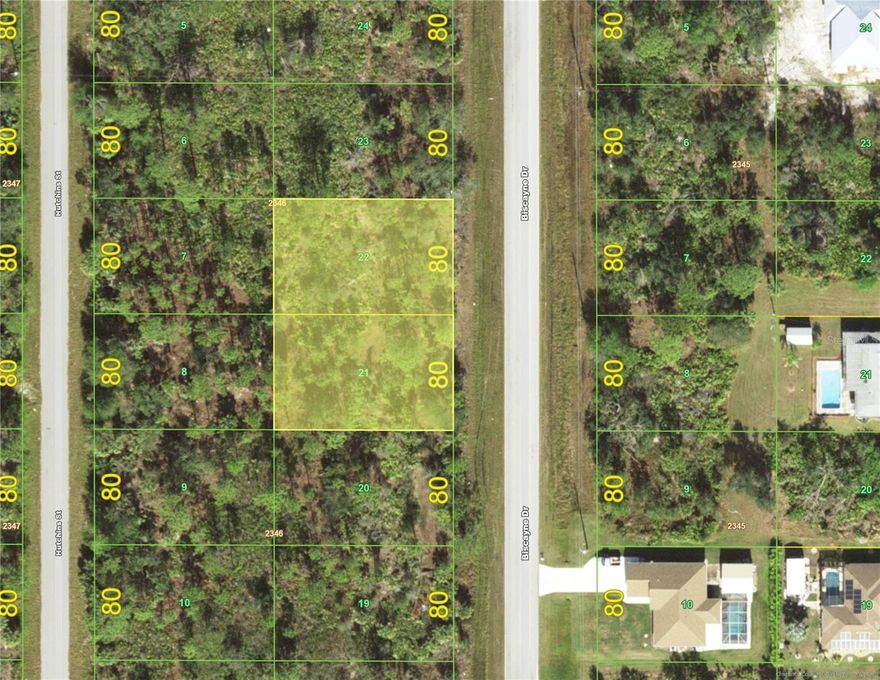 Build one home or two on this double lot with public water and power!