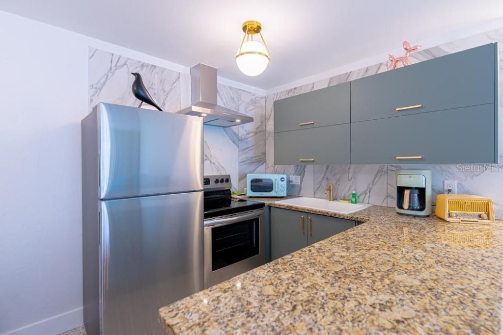 Photo of 648 Poinsettia Avenue, Clearwater Beach, FL 33767 (MLS # TB8363396)