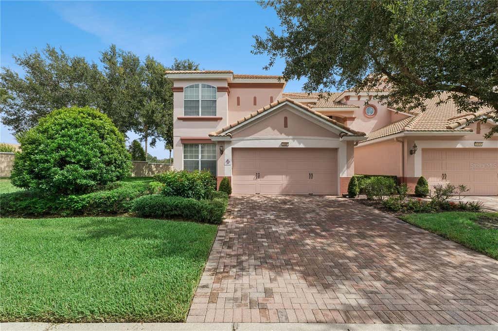 Photo of 1406 Milledge Lane, Davenport, FL 33896 (MLS # O6431689)