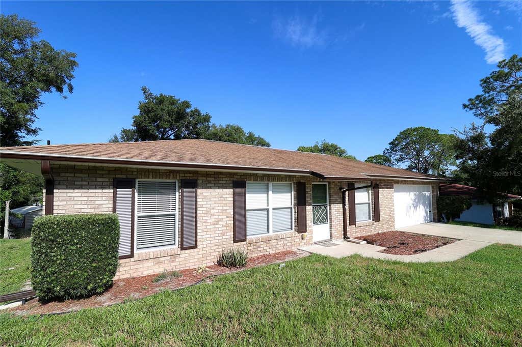Photo of 1526 Piedmont Drive, Deltona, FL 32725 (MLS # O6435737)