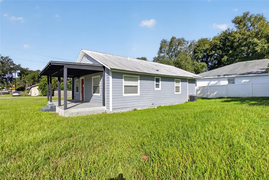 Photo of 4104 Orange Avenue SE, Highland City, FL 33846 (MLS # O6433826)